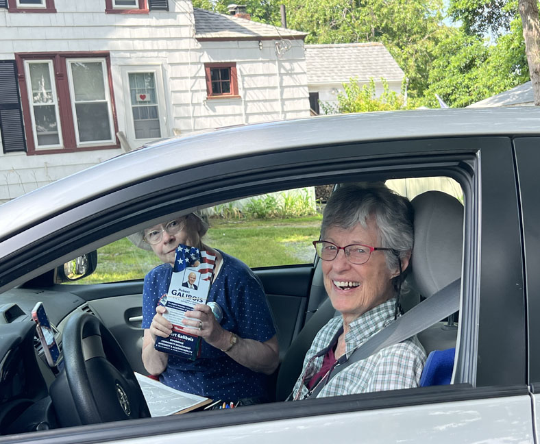 Canvassers in car, smiling